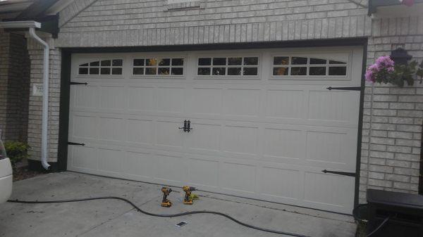 16 X 7 Garage door with windows professional install