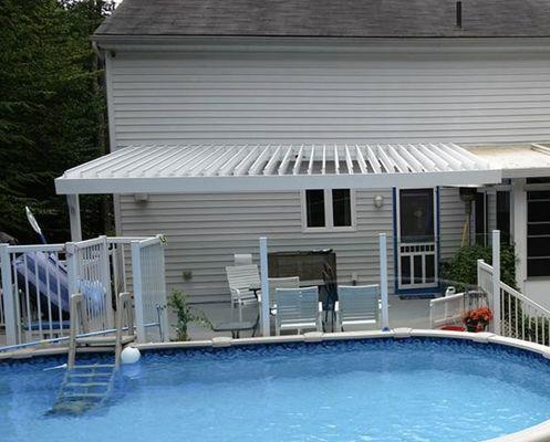 Equinox Louvered Roof system easily blocking out rain and harsh sun.