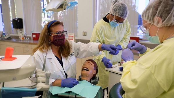 Dental Assisting instructor teaching students