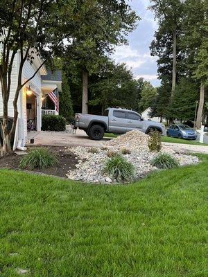 River rock being installed