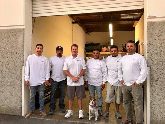 Norman and the team in front of our warehouse.