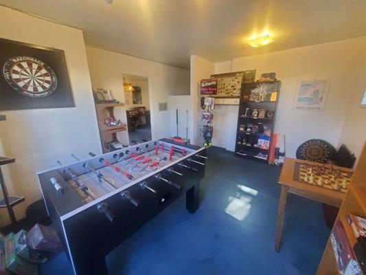 Side room full of games - ping pong, darts, chess,  fooseball etc.  Tons of high end supplies