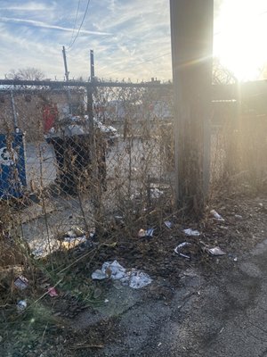 Trash inside the back of the building.