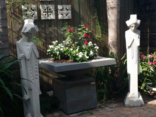 The Showroom features Frank Lloyd Wright planters, statues and other concrete garden decor.