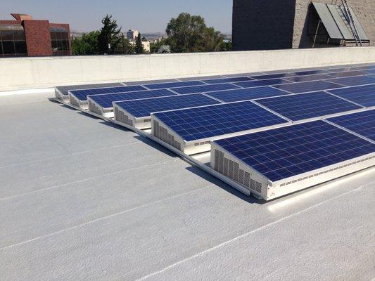 Commercial solar installed on flat roof with no penetrations on the roof