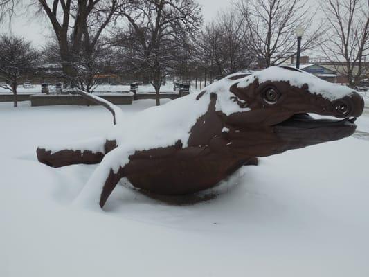 Sir Rustolot, the library's friendly dragon, covered in snow. Feel free to climb him and take pictures!