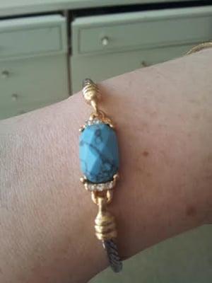 $12 turquoise-style bangle with hook clasp and faux stones.