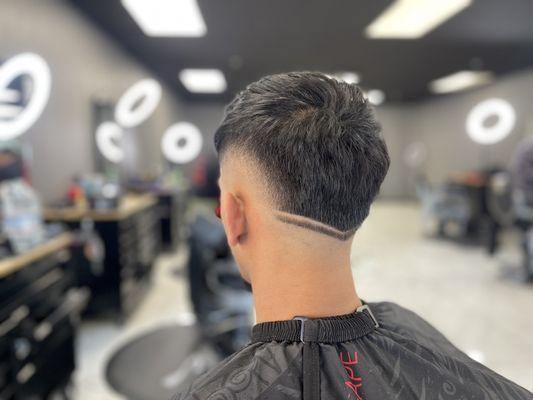 burst fade with V taper in the back