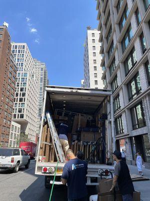 Boxes loaded securely in the truck by experts.