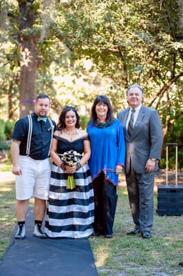 Rudy and Cindy, and Tiffany and I after our ceremony. They presented us with a family bible to hand down to future generations.