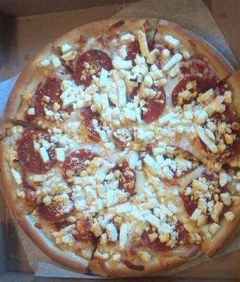 Small cheese, pepperoni and feta pizza.