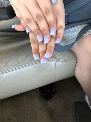 This is the photo of one of my girls nails that was not the shape she wanted , the length, and also cut her and pulled her cuticle.