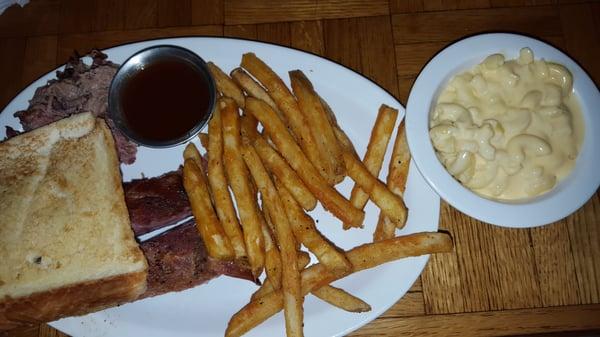 Chopped brisket, ribs, seasoned fries, and macaroni