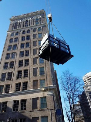 Machinery Movers & Erectors rigged and set a 36,500lb emergency generator on the 9th floor of a building in downtown Richmond.