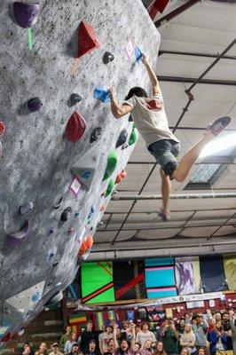 Jordan Shepard climbing in the finals at Beta Boulder Blast's climbing competition.