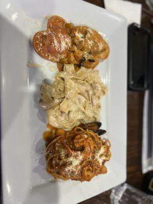 Lobster ravioli, fettuccine and sea food pasta