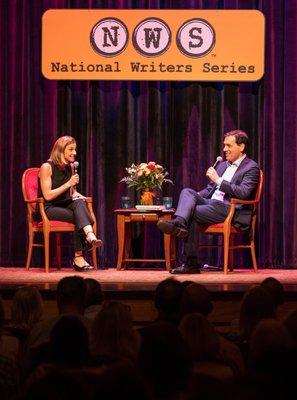 Guest host Angie Morgan talks with author Daniel Pink on stage at the City Opera House.