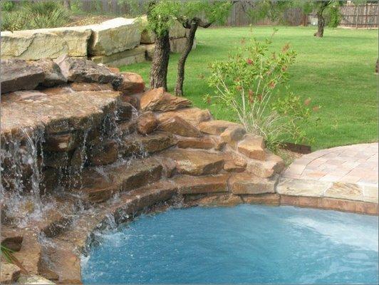 Our awesome Jumping rocks and water feature! Our kids LOVE this.