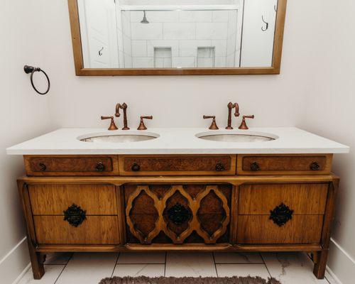 Antique dresser turned into a bathroom vanity