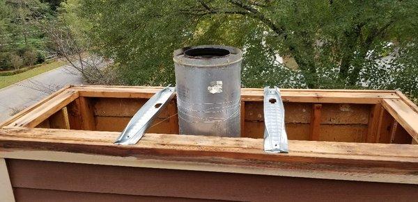 Metal stud bracing installed for rain pans