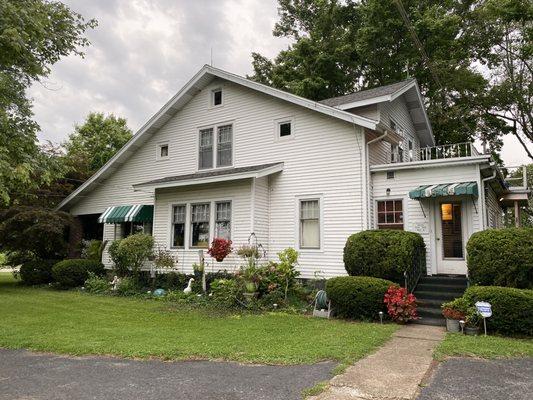 House on the property; office for checking in in the back.