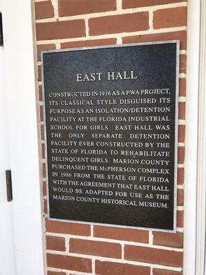 Plaque describing history of building.