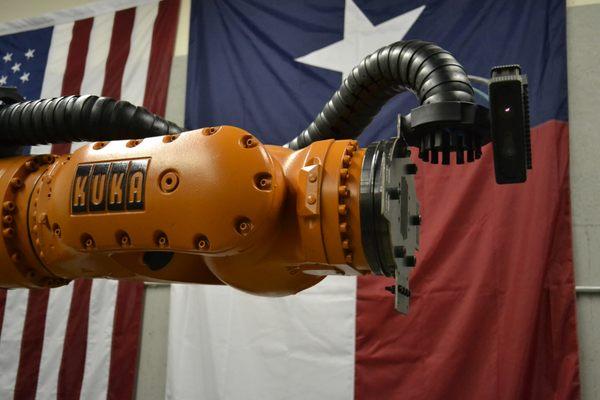 Kuka brand robotic arm with our 3D Machine Vision System