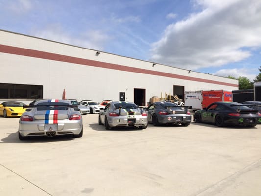 Cars staged to load up for the track.