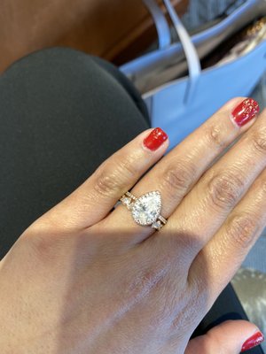 Trying on wedding band with my engagement ring