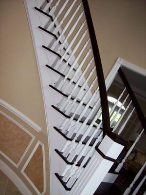 Arts & Crafts railing system with Box Newel and white balusters.