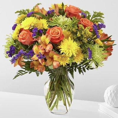 FTD Marmalade Skies bouquet. Dimensions listed at 24" tall by 18" wide in 8" tall vase.