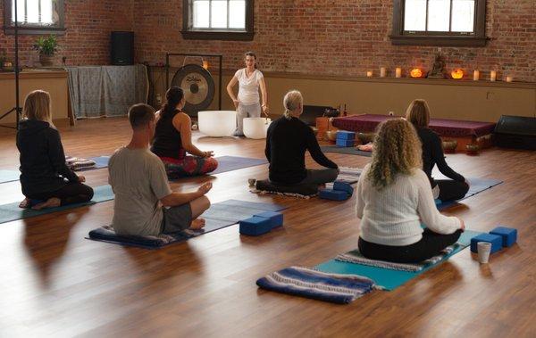 Brief centering with the bowls at the beginning of class.