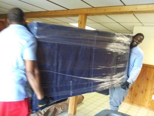 Carrying heavy furniture inside