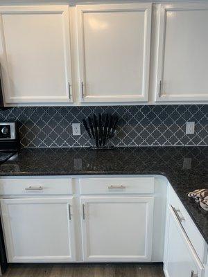 New countertops, backsplash, cabinets, and hardware