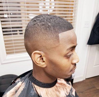 Low and dark mid skin fade