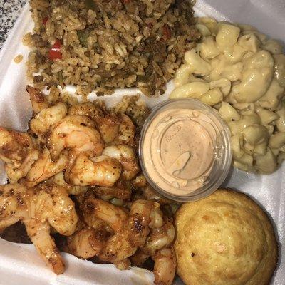 Bayou Box 
Grilled Butterfly Shrimp 
Featured sides are Dirty Rice & 6MAC
*all boxes include a cornbread muffin and (1) swamp sauce*