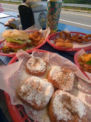 Burgers, nachos, and fries dough on the lake