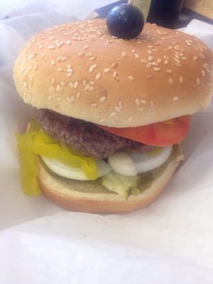 Sundance Kid: yellow mustard, relish, onions, banana peppers, tomato, pickles