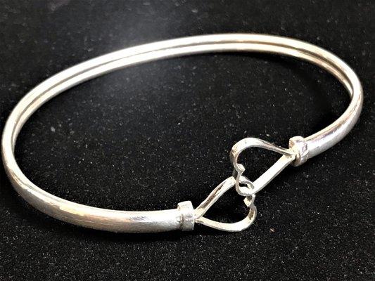 One of our classic heart bracelets that my brother and I made years ago.  Interlocking hearts are simple but elegant.