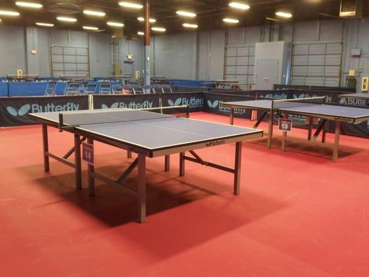 Princeton Pong-10,000 sq ft elite table tennis facility featuring 14 table tennis tables, sport flooring, high ceilings!