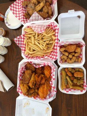 Habanero Buffalo wings, Parmesan garlic wings, fries, coconut shrimp, zucchini, fried okra, popcorn shrimp, spicy shrimp, Macncheese bites!