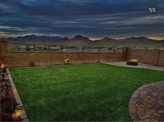 Pavers, firepit, and landscape with firepit