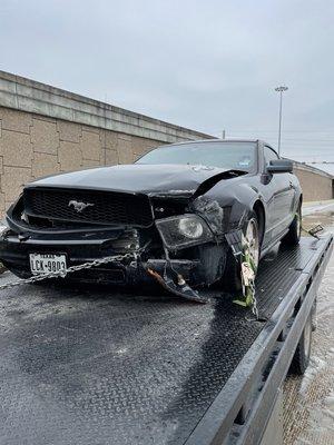 Towing a wrecked mustang