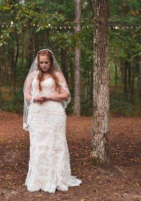 A bride's private moment in the Fairytale Woodland area