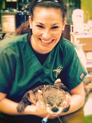 Dr. Mary Volker with a special river otter friend