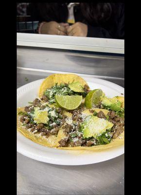 4mini Tacos with your choice of meat either Asada, Al Pastor or mix topped with Onions, Cilantro slices of Avocados and served with limes