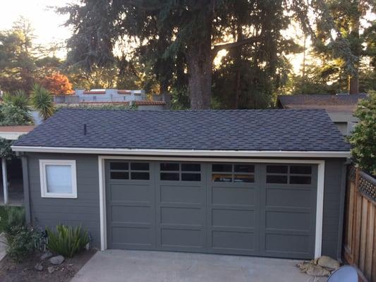 New roof on garage provided by Legacy Roofing