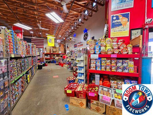 Moving thru the entrance to 2 sections of firecrackers ranging from belts to bricks to16,000 rolls.