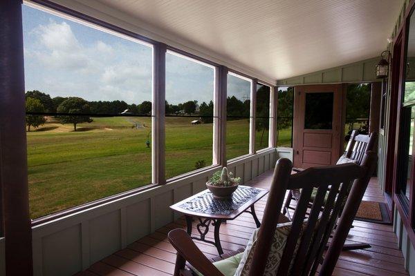 Front porch overlooking 46 acres of meadow and forest.