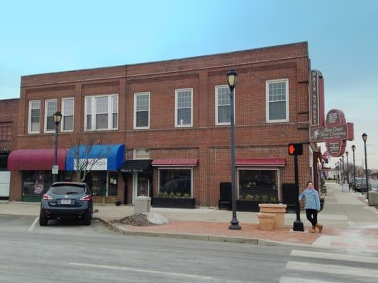 located in the heart of Fairborn, on the corner of Central and Main St. Look for the BLUE awning, with purple doors underneath.